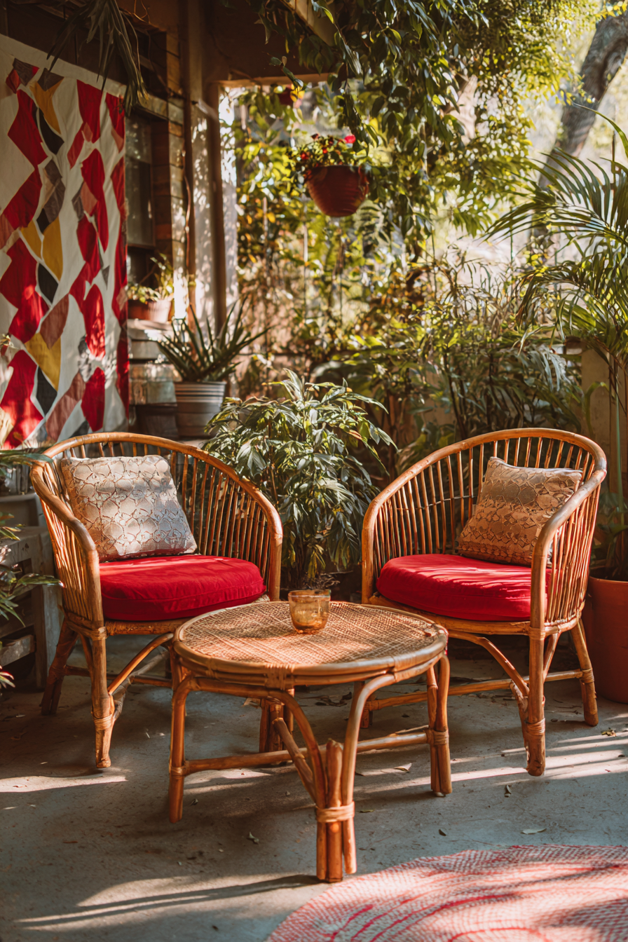 Pair Rattan Chairs with Bold Cushions for a Sunlit Nook