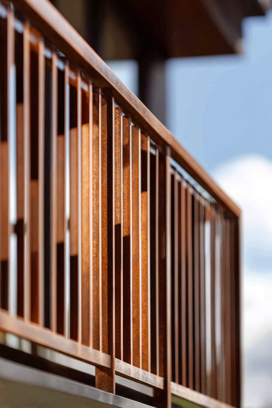 Use Vertical Slats for a Sleek, Airy Deck Skirt